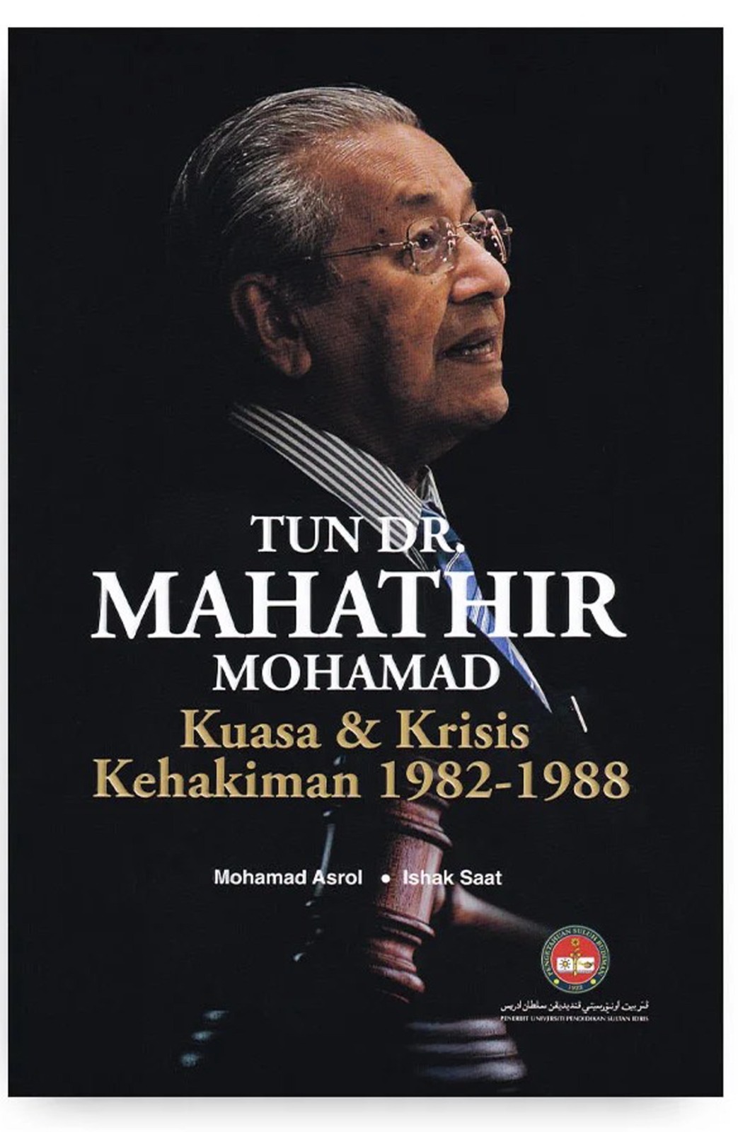 Buku sejarah politik yang membahas latar belakang terjadinya krisis kehakiman malaysia era 1980-an.